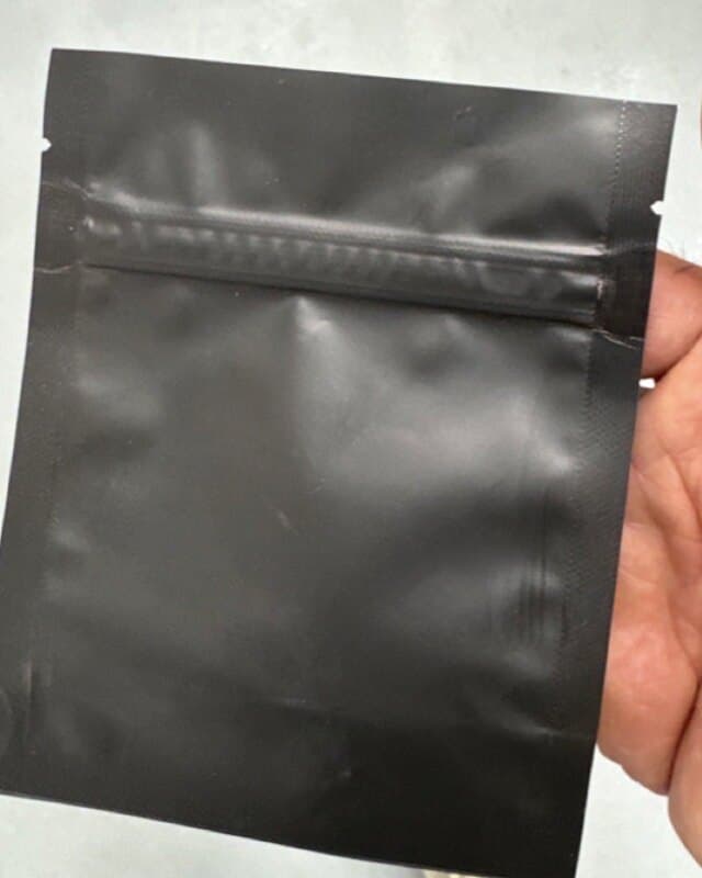 Child-resistant Mylar exit bag, printed and labeled to spec